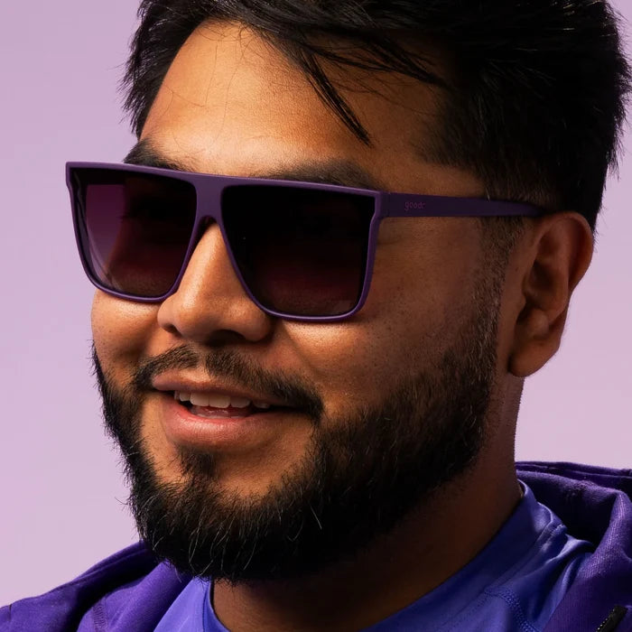 Style and fit showcase of oversized flat-top dark purple sunglasses with gradient lenses. No slip, no bounce, all polarised.