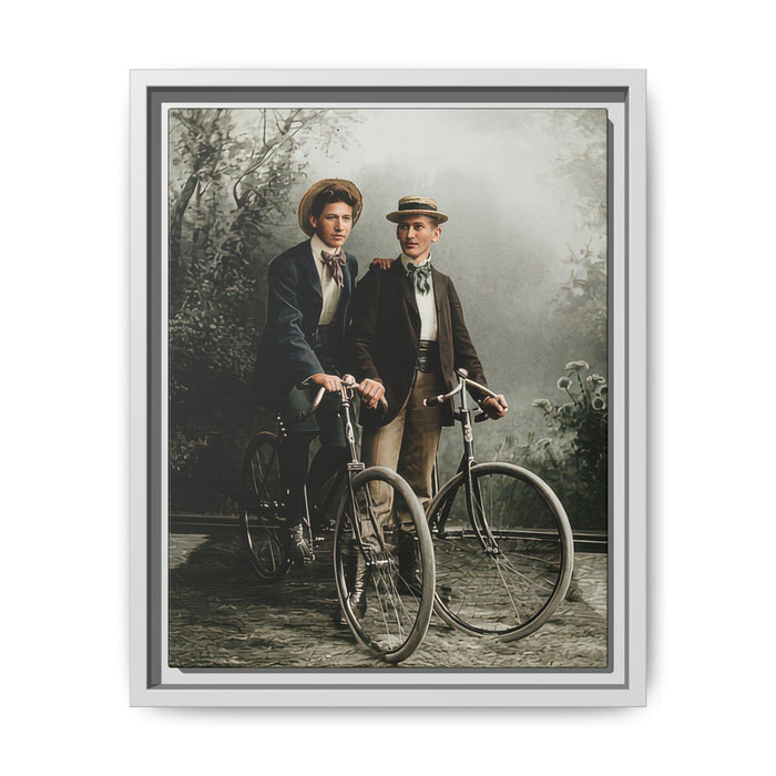 Historical bicycle photograph featuring two figures in tailored suits and straw hats
