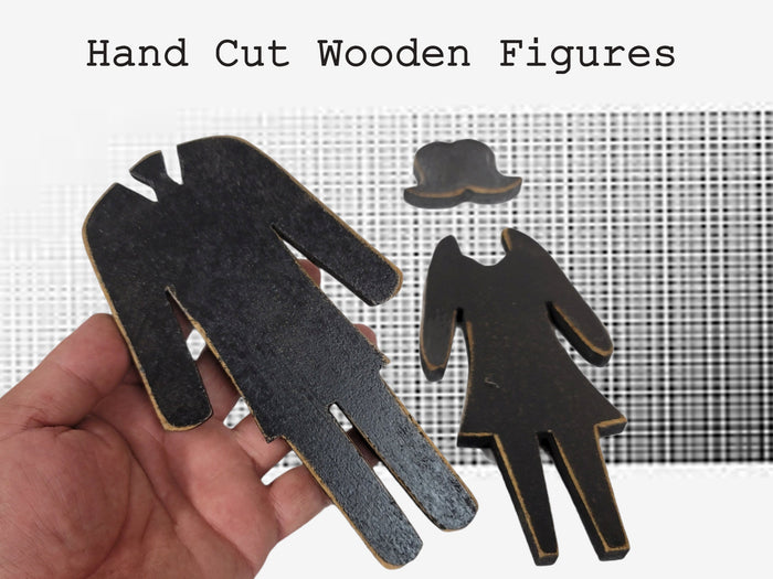 bathroom sign wooden man and woman figures
