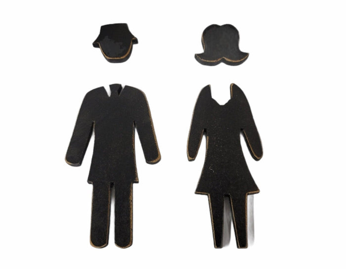 bathroom sign wooden man and woman figures