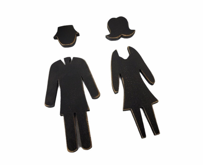 bathroom sign wooden man and woman figures