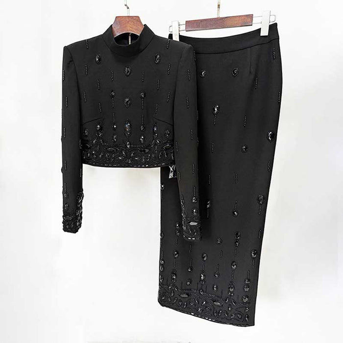 Elegant beaded women's skirt suit in black with intricate beading and a tailored fit
