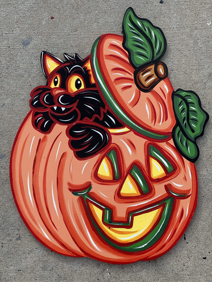 cat coming out of pumpkin painted yard art design