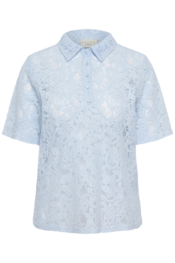 Light blue lace blouse on a white background