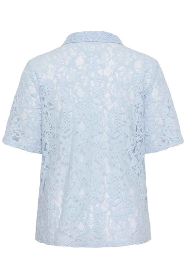 Light blue patterned shirt on a white background