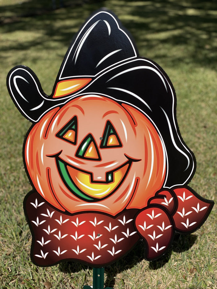 pumpkin with cowboy hat and bandana painted yard art design