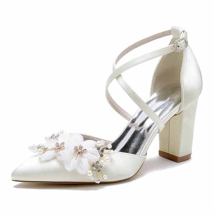 Elegant cross strap wedding shoes for women with floral embellishments and a block heel