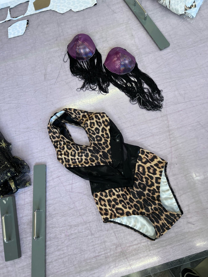 leopard print leotard with black panels