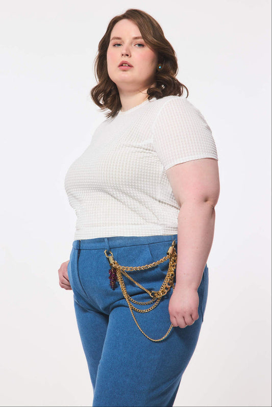 Side View Of Plus Size Denim Culotte with Decorative Chain Belt