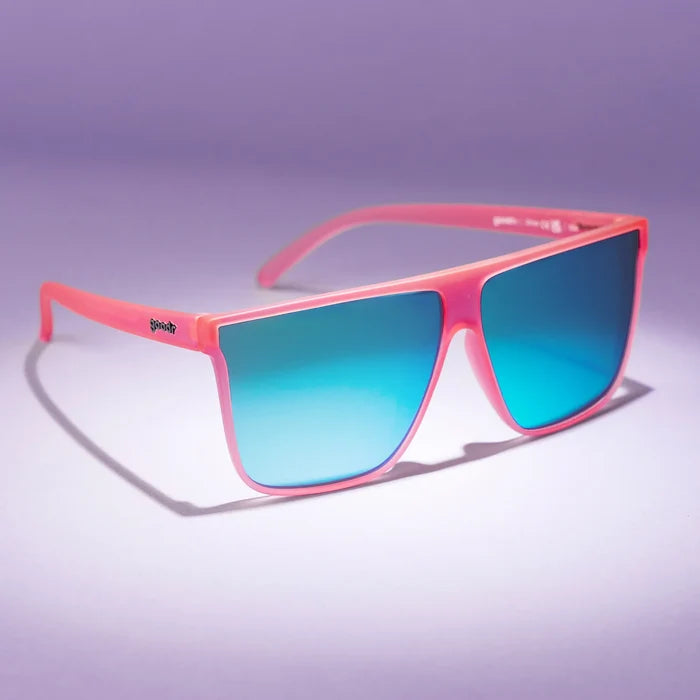 Hot pink sunglasses with mirrored reflective lenses in teal. Flat-top frames with a wider fit. No slip, no bounce, all polarised.