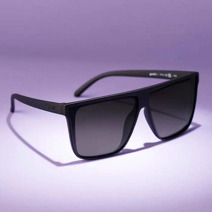 Black wide-fit, oversized sunglasses with non-reflective lenses. No slip, no bounce, all polarised.