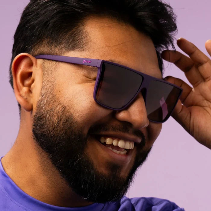 Style and fit showcase of oversized flat-top dark purple sunglasses with gradient lenses. No slip, no bounce, all polarised.