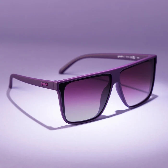Oversized flat-top dark purple sunglasses with gradient lenses. No slip, no bounce, all polarised.