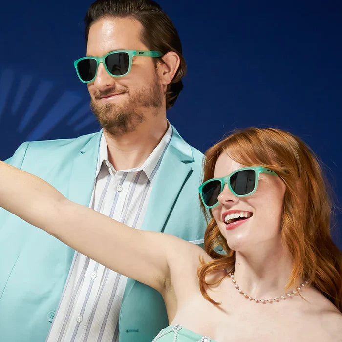 Men's & Women's style and fit showcase of mint coloured square-frame sunglasses.