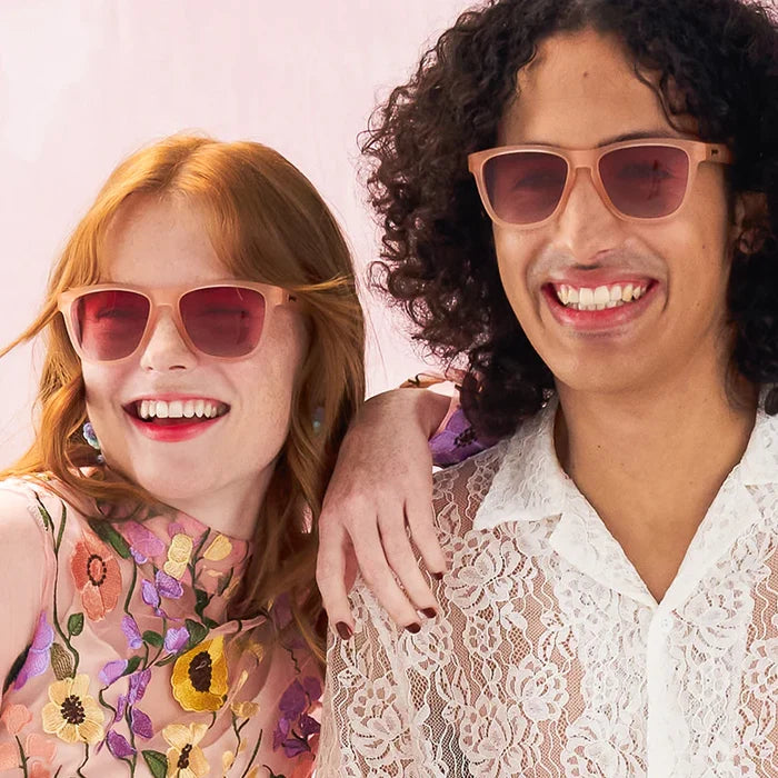 Men's & Women's fit and style showcase of pink square-shaped sunglasses with pink gradient lenses.