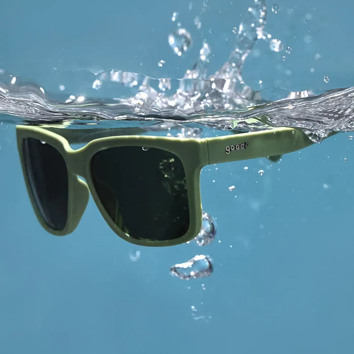 Dark green polarised sunglasses with non-reflective lenses. Water repellent and capable of floating.