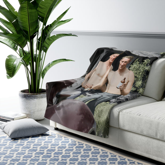 Historical sherpa blanket with relaxed outdoor leisure scene and archival character