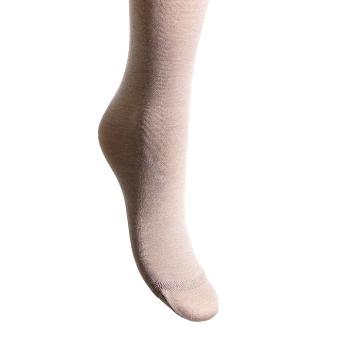 Noisette coloured hold ups worn by a person on a white background