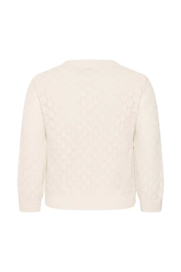 White cable knit sweater on a white background