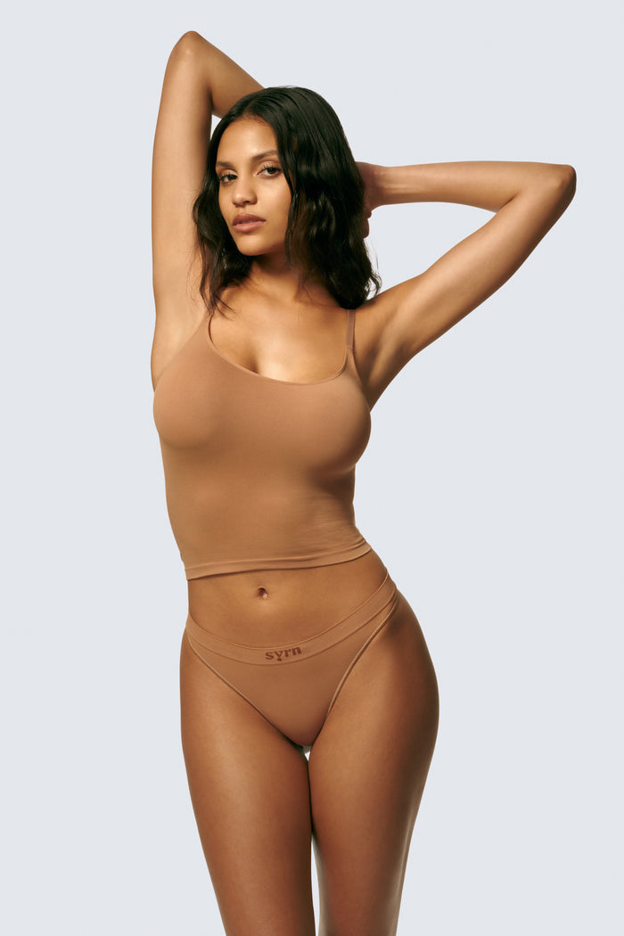 Michaela is 5’8 and wears sizes 34DD and M on top and S on the bottom