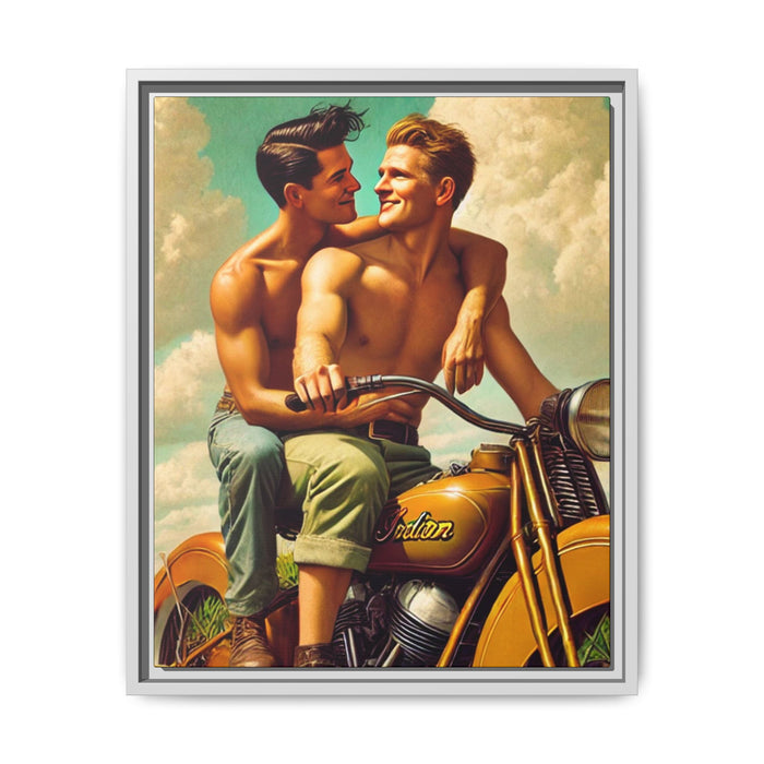 A vintage-style portrait of two young, shirtless men sitting together on a classic mustard-yellow Indian motorcycle. One man, with dark hair, sits behind the other and wraps his arm lovingly around his partner’s shoulder, gazing into his eyes. The man in front, with light hair, grips the handlebars and smiles back at him. Both wear rolled-up pants and sturdy boots. The background features a bright, partly cloudy sky, evoking a sense of freedom, warmth, and queer joy in mid-20th Century
