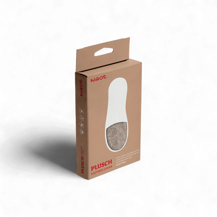 Packaged Plusch wool liner for shoes, displayed in a cardboard box with a clear window showing the white and beige woolen insole.
