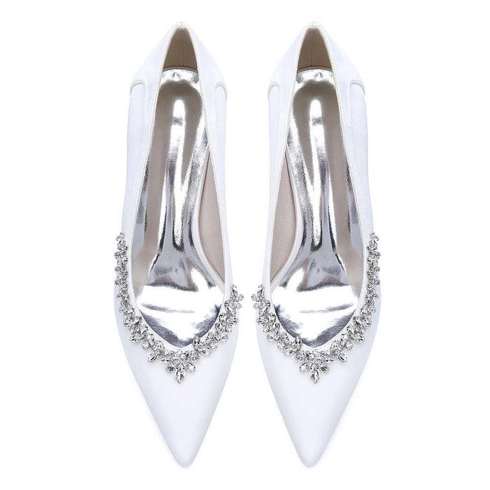 Elegant white rhinestone chunky heel prom shoes with a pointed toe and intricate embellishments