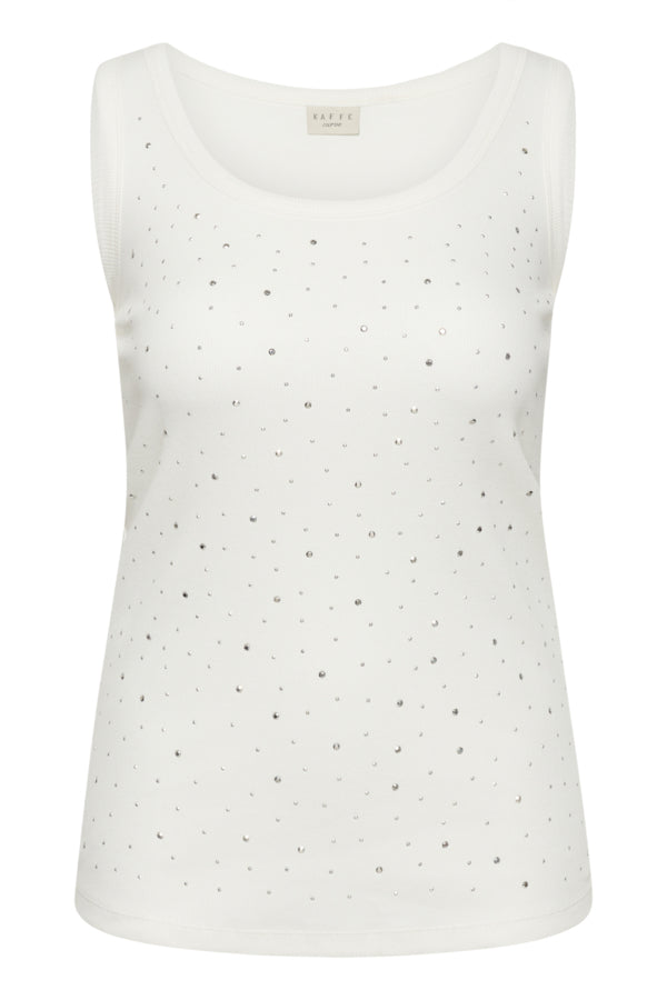 White sleeveless top with black polka dots on a white background