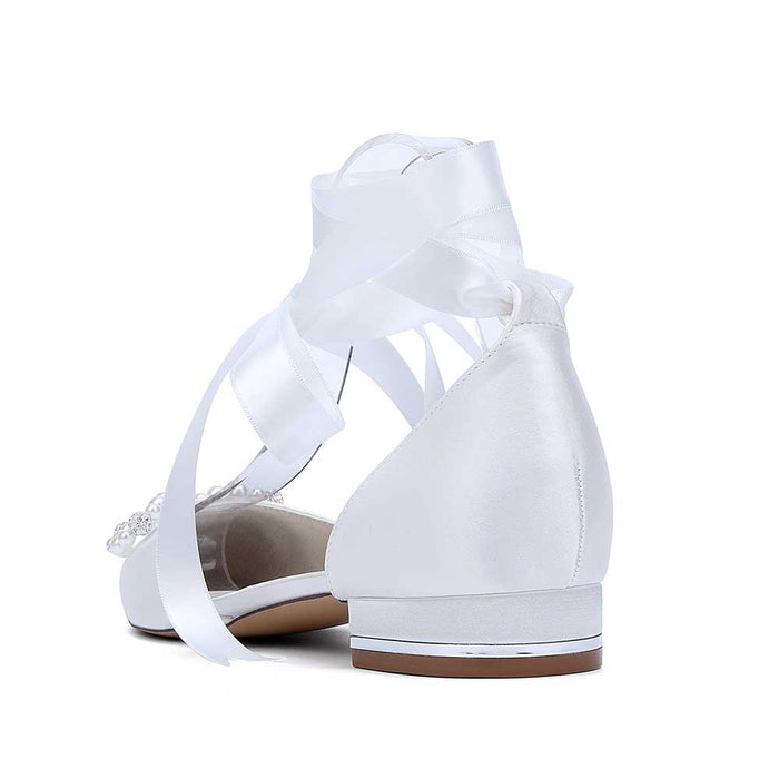 Elegant bridal ankle strap flat shoes with satin finish and decorative ribbon for a stylish wedding look