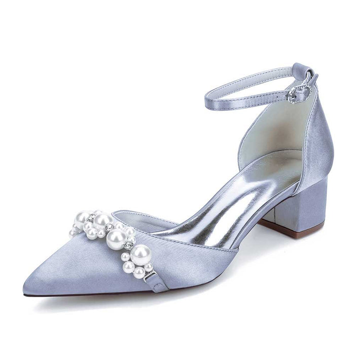 Elegant pearl embellished bride shoes in light blue satin with ankle strap and pointed toe design