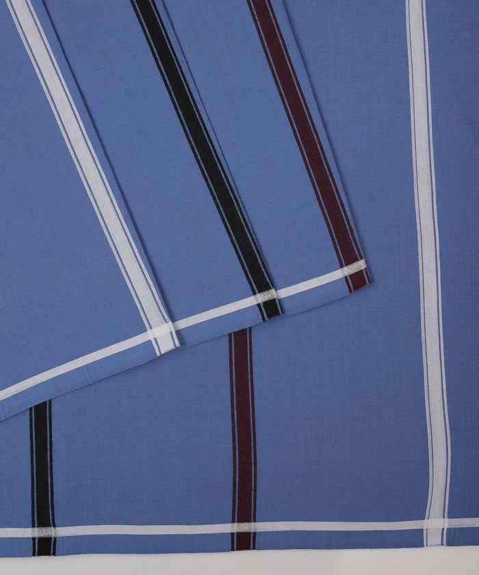 Close-up of blue fabric with white and brown stripes