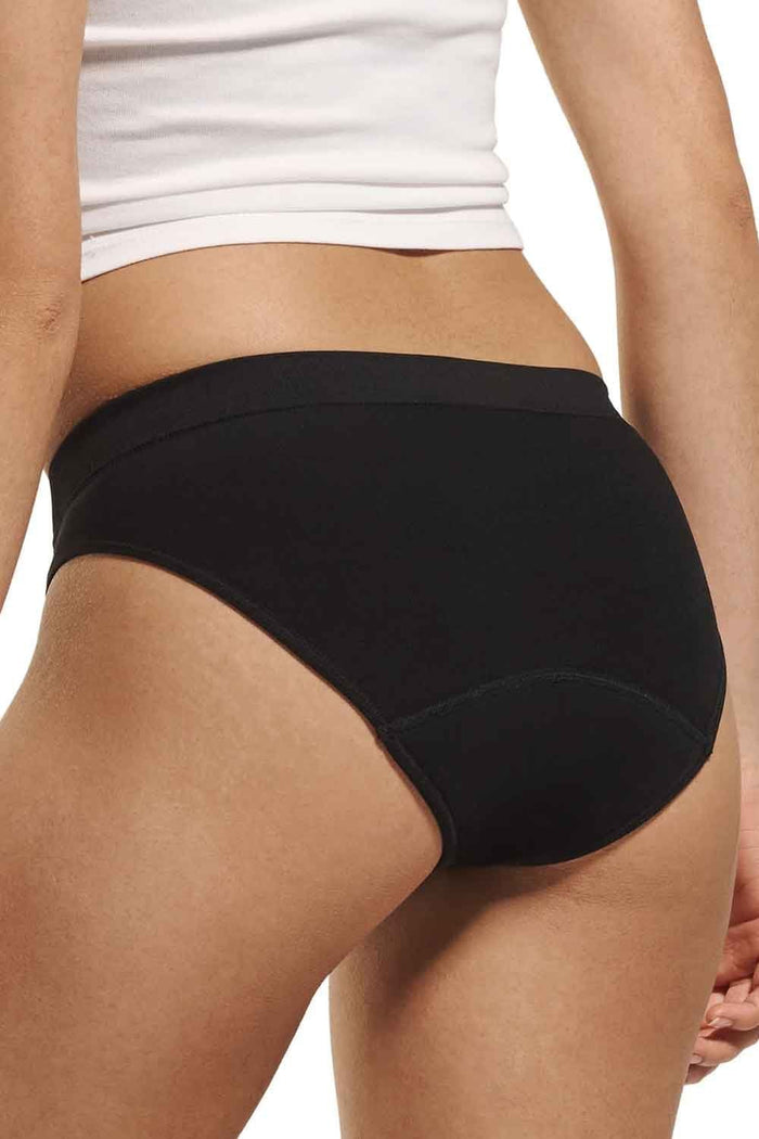 Person teens first seamfree period bikini brief with a white background