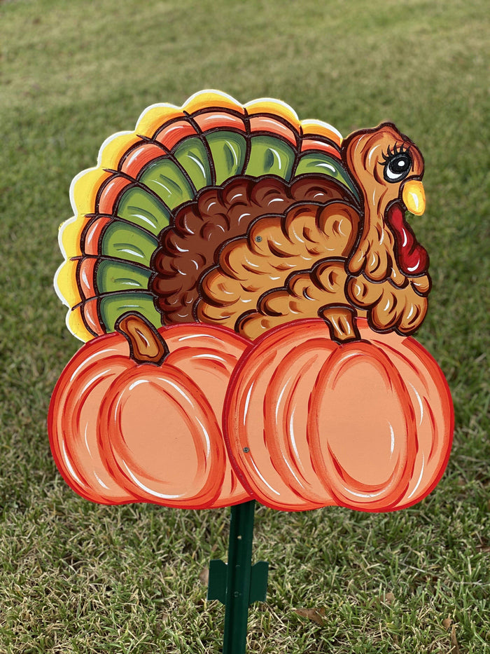 turkey on pumpkins painted yard art