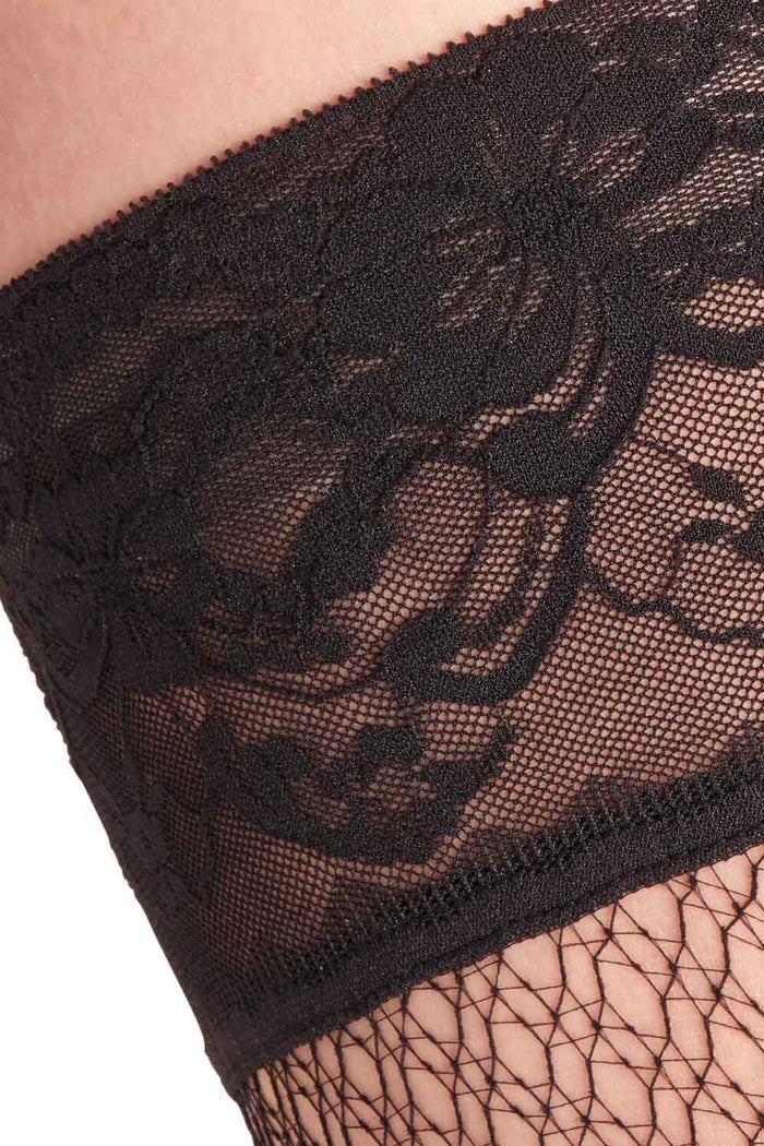 Close-up of black lace top hold up with floral design