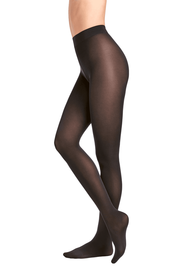 Black tights worn by a person on a black and grey background
