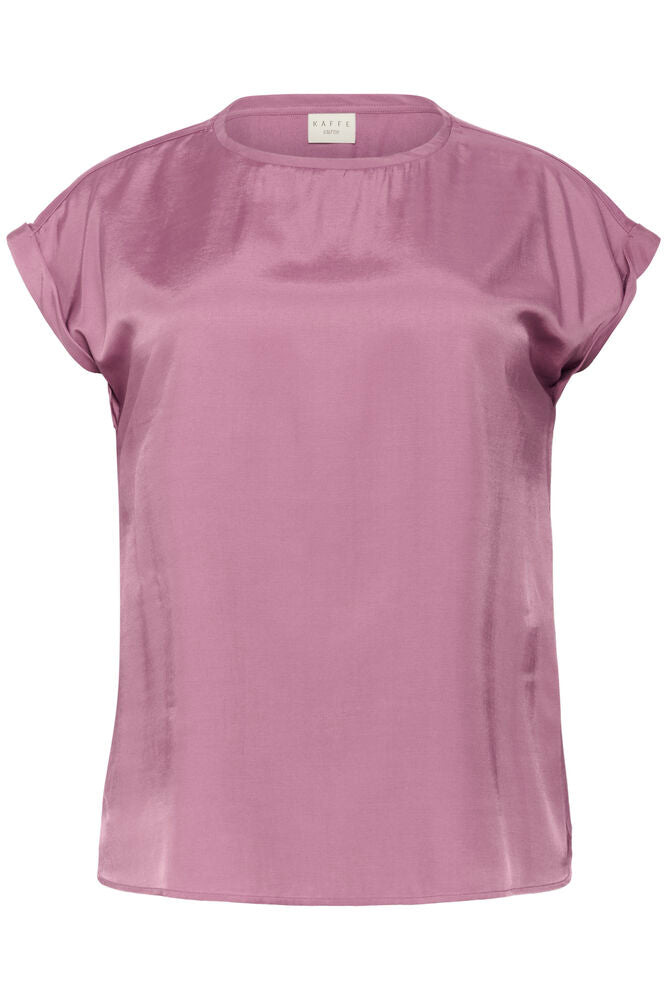 Pink blouse on a white background